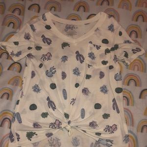 very cute cactus and plant themed shirt, and it’s a little transparent.🌵🤍